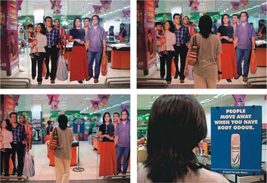 Life-size stickers of people were stuck on automatic sliding doors at a<br />mall in Mumbai, India. When someone approaches the doors move apart and it<br />feels like the people on the door are moving away. The person enters to<br />find the message 'People Move Away W
